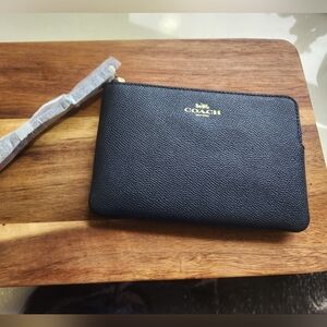 NWT Coach navy blue wristlet